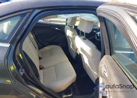 2015 Ford Focus Titanium из США, поврежденный, VIN 1FADP3J29FL333244